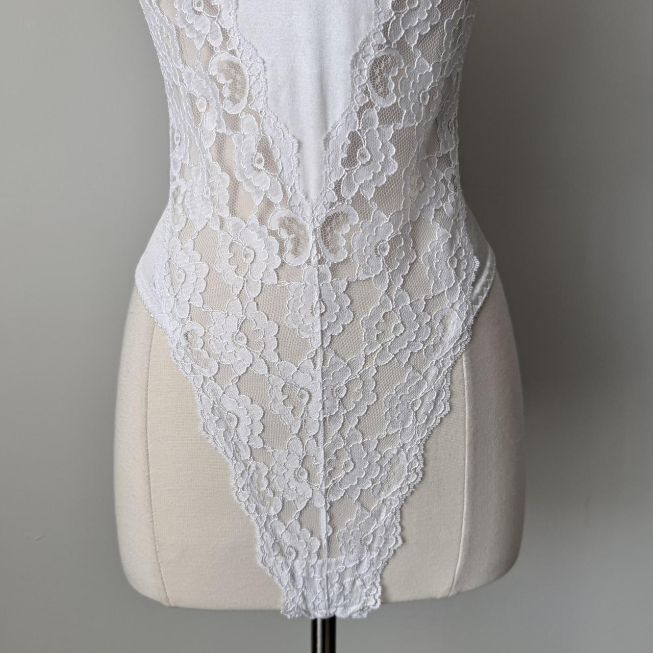 Victoria’s Secret dainty lace bodysuit (34B)