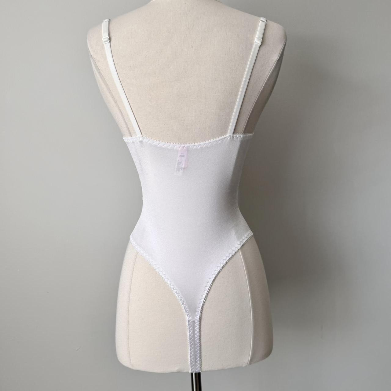 Victoria’s Secret dainty lace bodysuit (34B)